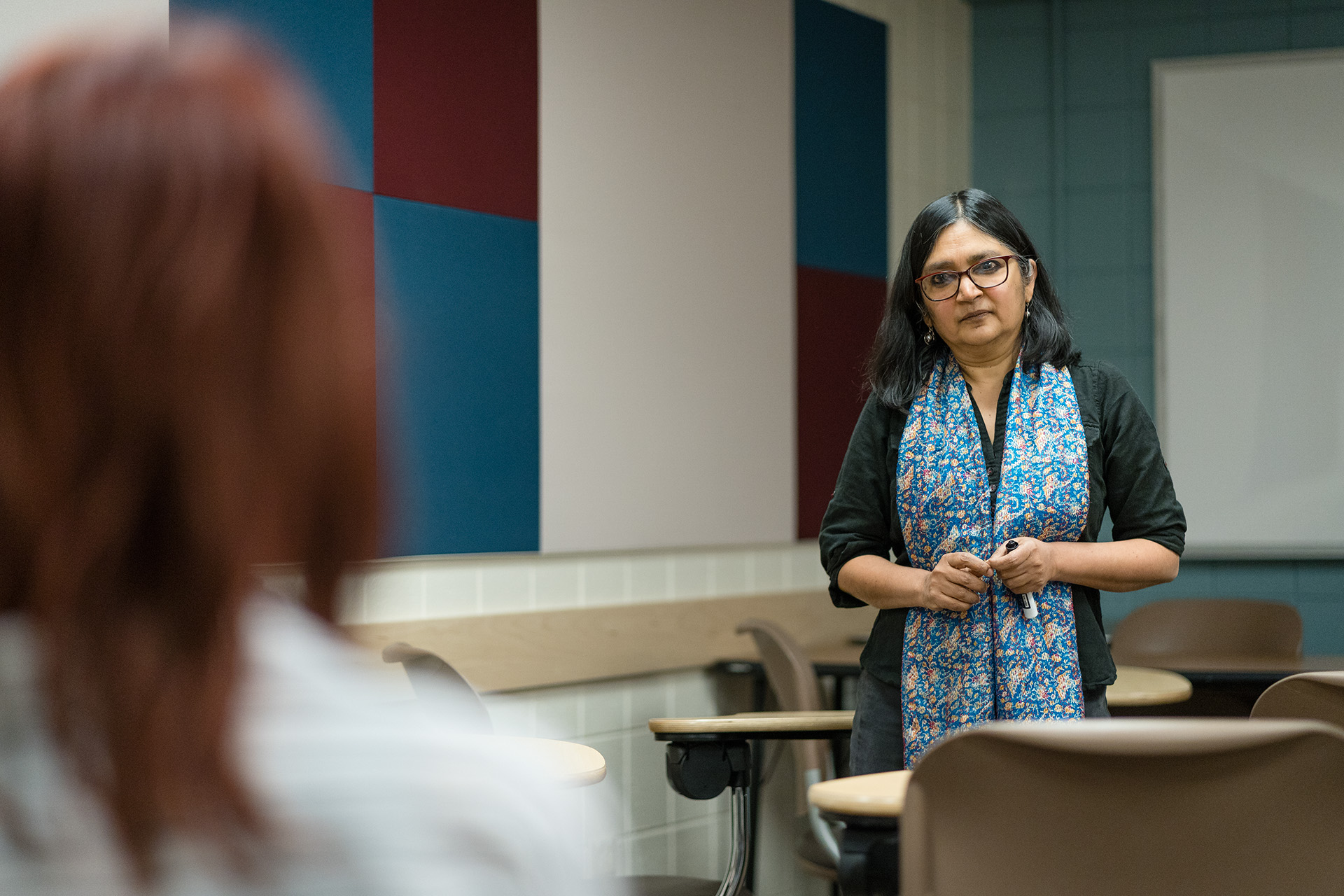 Professor Ramaa Vasudevan interacts with students in the Economics 376 class, May 2, 2019.